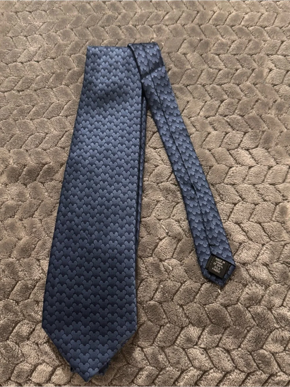 Walt Disney World Mickey Mouse Tie. Navy with subtle Mickey Mouse design.